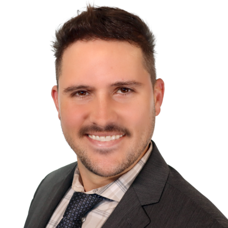 Corporate headshot of a man looking at the camera